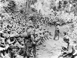 American soldiers resting during the Bataan death march, May 1942